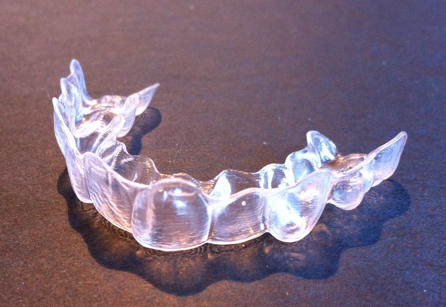Invisible aligner in carry case
